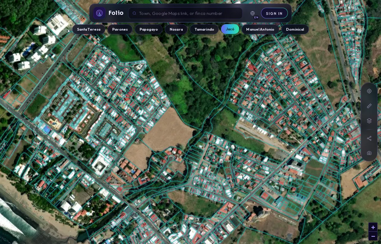 Jacó in the Folio app: satellite map with every registered parcel outlined